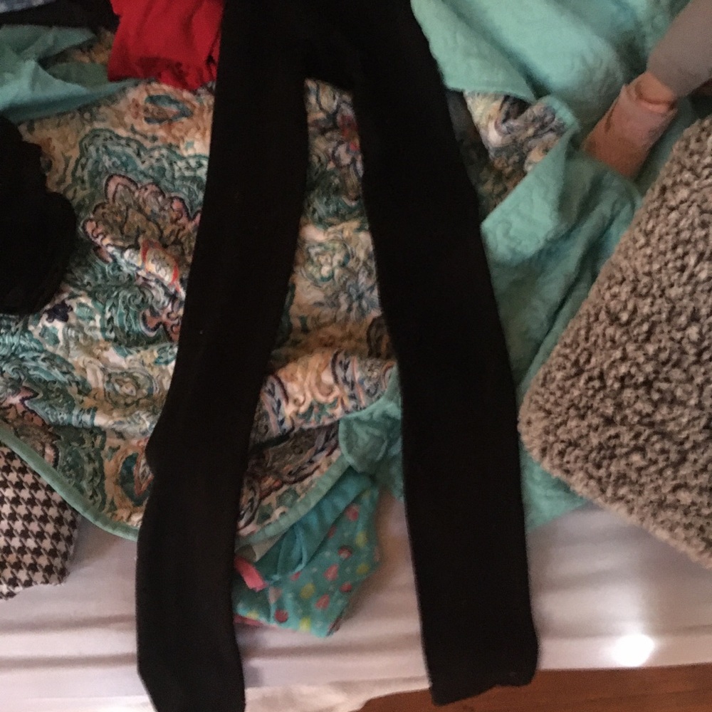 Black panty hose like with feet in them
